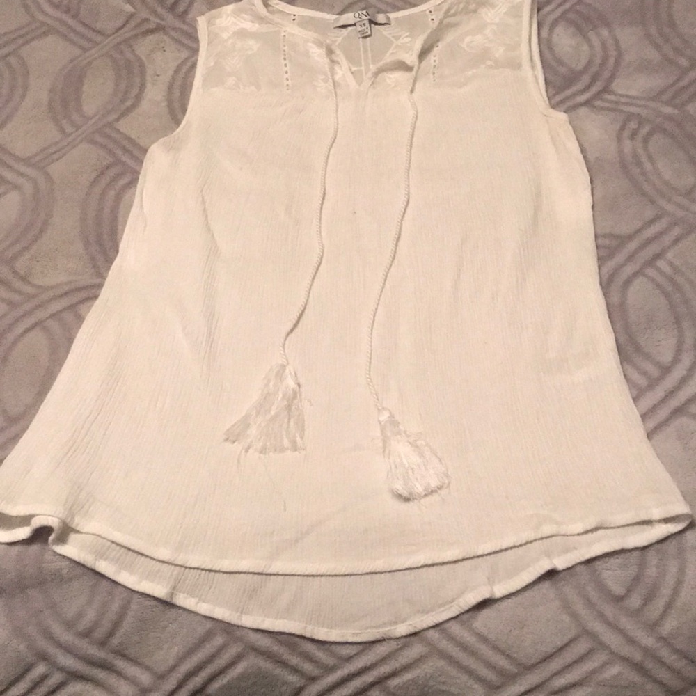 White sleeveless blouse